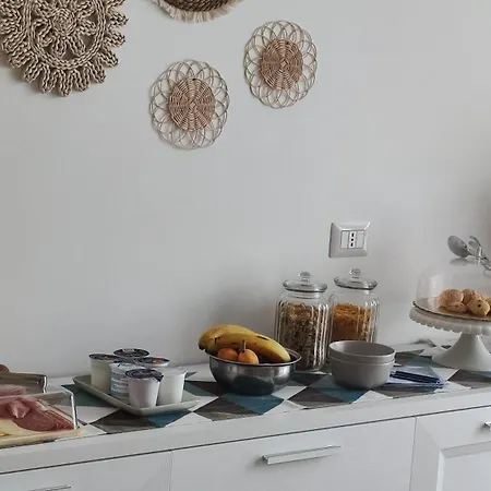 Lora Giusta Πανσιόν Όπως