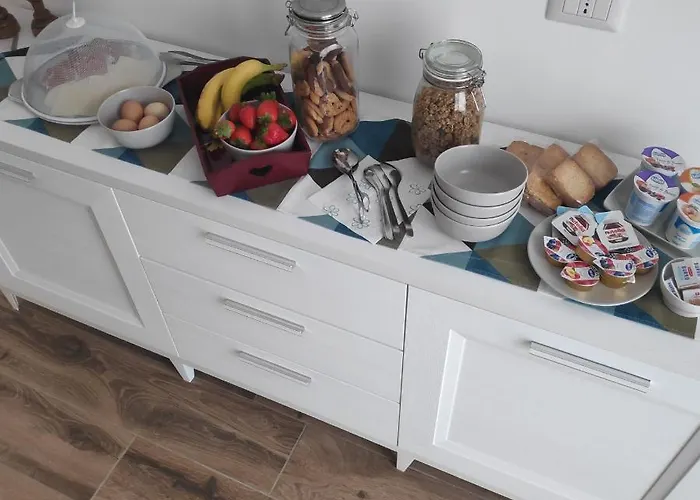 Lora Giusta Πανσιόν Όπως